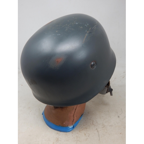 244 - WWII German Paratroopers Helmet. Note: Customers must satisfy themselves prior to bidding in regard ... 