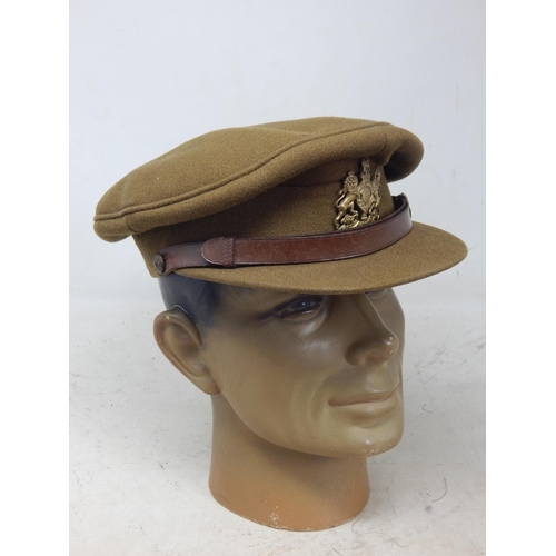 245 - WWI Officers Peaked Visor Cap. Note: Customers must satisfy themselves prior to bidding in regard to... 