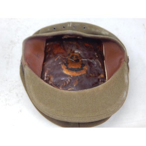 245 - WWI Officers Peaked Visor Cap. Note: Customers must satisfy themselves prior to bidding in regard to... 