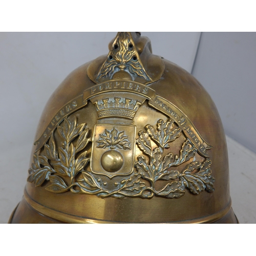 248 - A Victorian Brass French Sapeurs Pompiers Fireman's Helmet. Note: Customers must satisfy themselves ... 