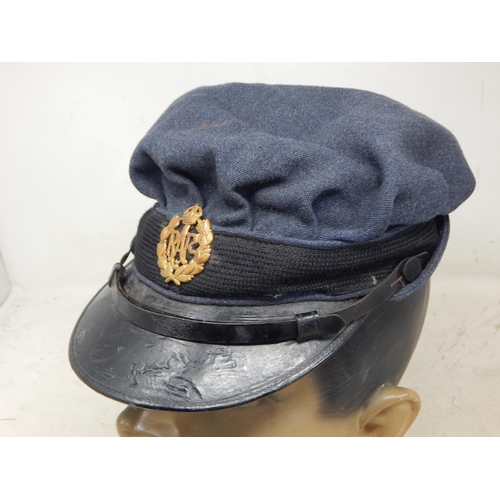 253 - Women's Royal Air Force (W.R.A.F) Peaked Visor Cap. Brass kings crown RAF cap badge to the centre wi... 