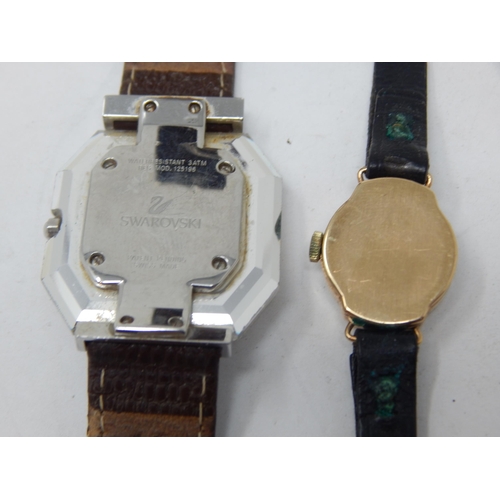 250 - Ladies 9ct Gold wristwatch twinned with a Swarovski ladies wristwatch