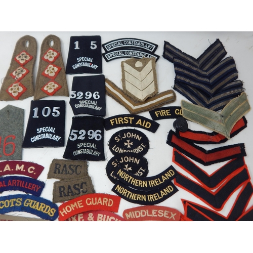 192 - A Quantity of Military Cloth Badges Including Special Constabulary, Military Stripes etc (lot)