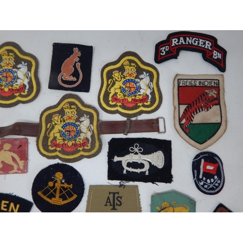 196 - A Quantity of Military Cloth Badges to Include Shoulder Titles