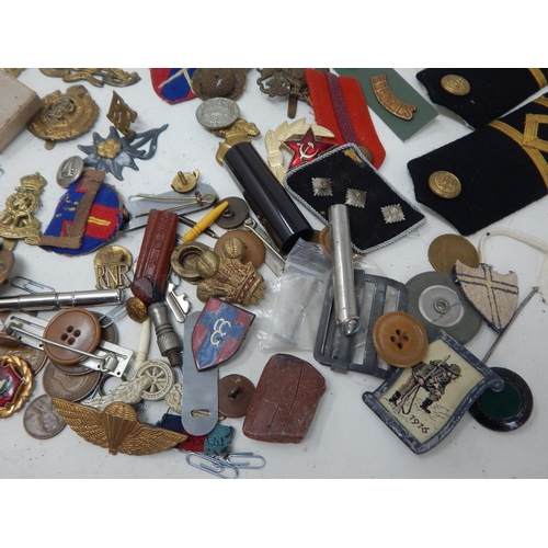 199 - A Box of Interesting Military Items Including Cloth Badges, Foreign Legion Armband, Cap & Pin Badges... 