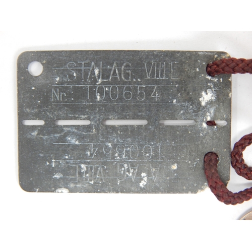 390 - WWII German Issued Prisoner of War Identity Tag: STALAG VIII C, No 100654 together with Silver Disc ... 