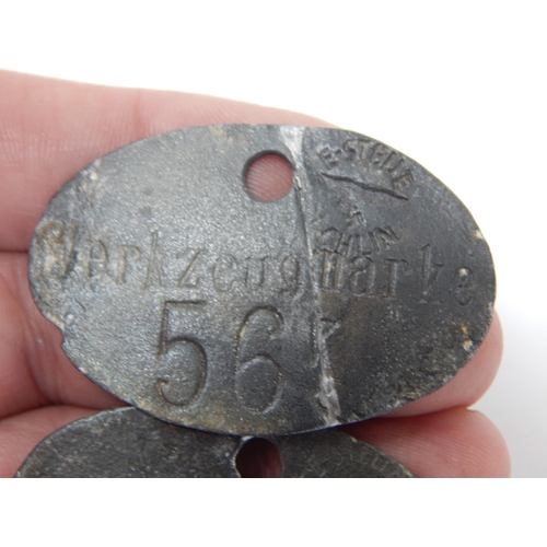 392 - WWII German WERKZEUGMARKE Identity Discs (2)