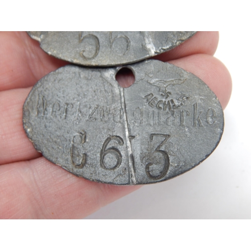 392 - WWII German WERKZEUGMARKE Identity Discs (2)