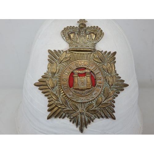 258 - British Dorsetshire Regiment Helmet with Chin Strap. Note: Customers must satisfy themselves prior t... 