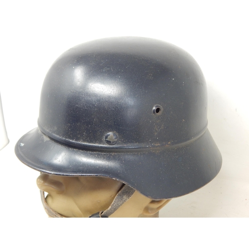 268 - WWII German M-35 Luftschutz Beaded Combat Helmet. Numbered on inner rim 20842. Note: Customers must ... 