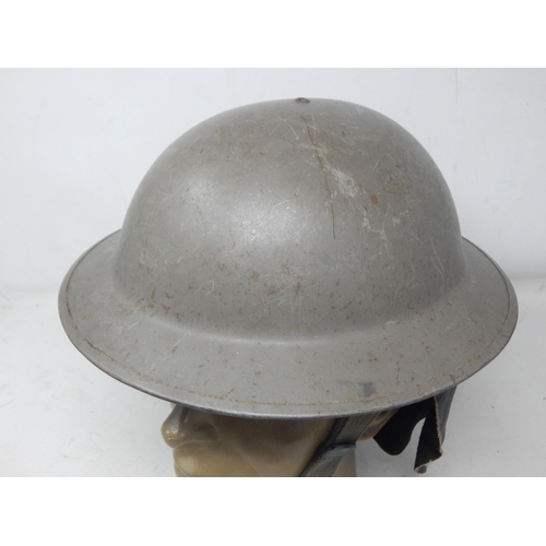 273 - WWII British Fire Helmet with Neck Protector. Please Note: Customers must satisfy themselves prior t... 