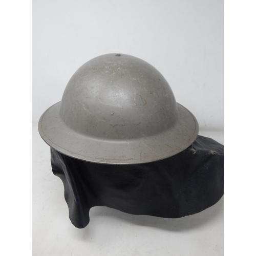 273 - WWII British Fire Helmet with Neck Protector. Please Note: Customers must satisfy themselves prior t... 