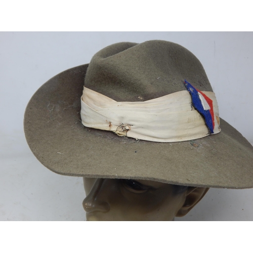 276 - WWII Khaki Felt Slouch Hat. Please Note: Customers must satisfy themselves prior to bidding in regar... 