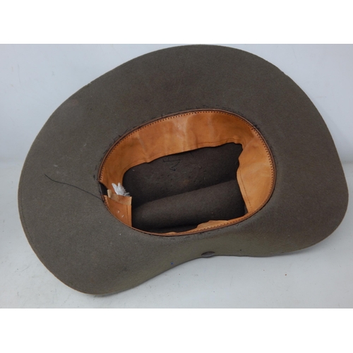 276 - WWII Khaki Felt Slouch Hat. Please Note: Customers must satisfy themselves prior to bidding in regar... 