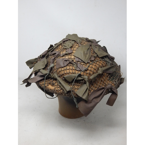 281 - WWII 1940 Dated British Mk II Brodie Helmet with Net & Camouflage. Please Note: Customers must satis... 