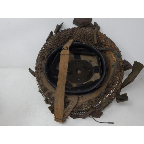 281 - WWII 1940 Dated British Mk II Brodie Helmet with Net & Camouflage. Please Note: Customers must satis... 