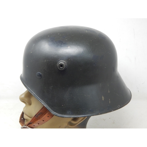 285 - WWII German Gunners Steel Helmet. Please Note: Customers must satisfy themselves prior to bidding in... 