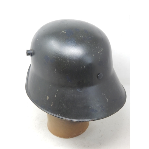 285 - WWII German Gunners Steel Helmet. Please Note: Customers must satisfy themselves prior to bidding in... 