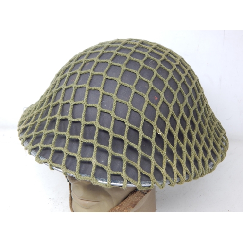 289 - WWII 1938 Dated British Brodie Helmet with Liner, Chin Strap & Netting. Please Note: Customers must ... 