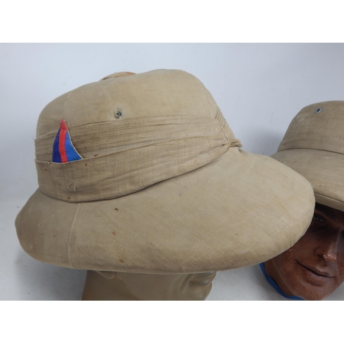 292 - WWII British Pith Helmets (2). Please Note: Customers must satisfy themselves prior to bidding in re... 