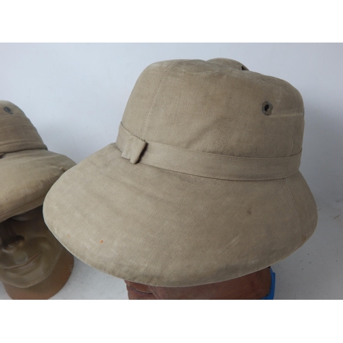 292 - WWII British Pith Helmets (2). Please Note: Customers must satisfy themselves prior to bidding in re... 