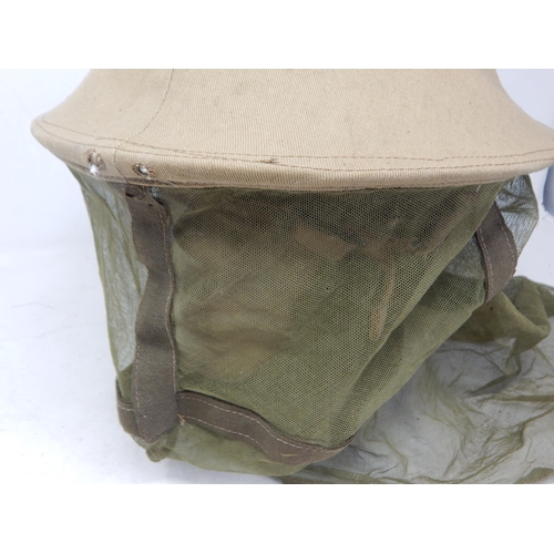 293 - WWII British Brodie Helmet with Hessian Covering & Mosquito Netting. Please Note: Customers must sat... 