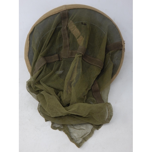 293 - WWII British Brodie Helmet with Hessian Covering & Mosquito Netting. Please Note: Customers must sat... 