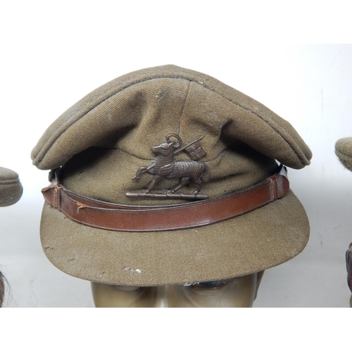 296 - WWI Officers Caps (3). Please Note: Customers must satisfy themselves prior to bidding in regard to ... 