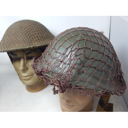 297 - WWII Brodie Helmets with Netting (3). Please Note: Customers must satisfy themselves prior to biddin... 