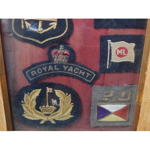 438 - A Quantity of Framed Naval Cloth Badges Including The Royal Yacht