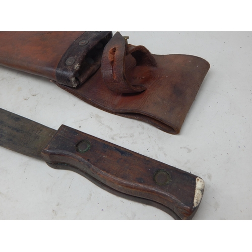 541 - WWI Machete with Marks for 1915 in Leather Scabbard. Length 48.5cm