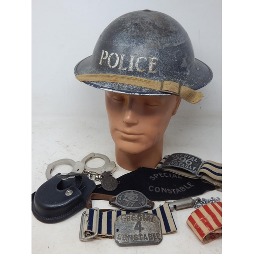 542 - WWII Police Steel Helmet together with Special Constable Badges, Whistle & Handcuffs (no key). Pleas... 