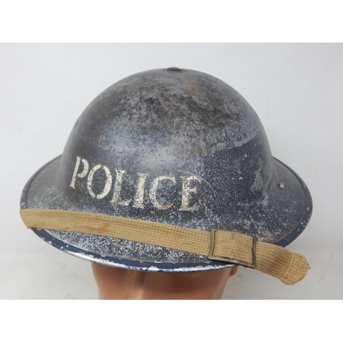 542 - WWII Police Steel Helmet together with Special Constable Badges, Whistle & Handcuffs (no key). Pleas... 