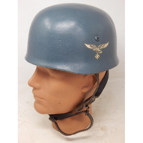 543 - WWII 1943 Dated German Paratroopers Helmet with Decal to One Side. Please Note: Customers must satis... 