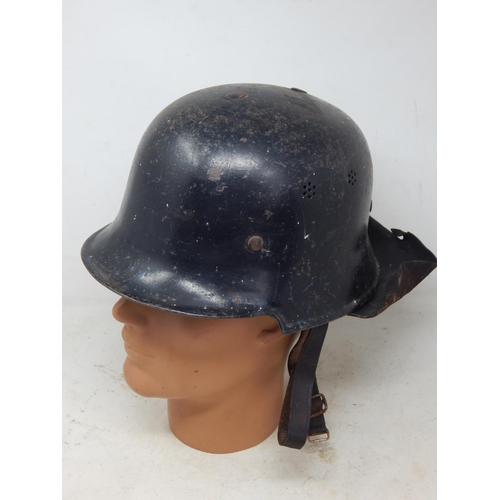 545 - German 1937 Dated M35 Helmet with Neck Protector. Please Note: Customers must satisfy themselves pri... 