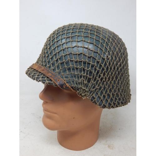 546 - WWII German M42 Helmet with Camouflage Netting. Numbered Inside ET62 & Painted Name 