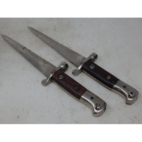 547 - A Pair of 1903 Dated Bayonet Daggers: Length 29cm