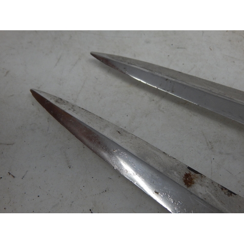 547 - A Pair of 1903 Dated Bayonet Daggers: Length 29cm