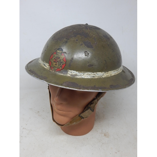 549 - WWII National Fire Service Steel Helmet with Web Chin Strap. Please Note: Customers must satisfy the... 