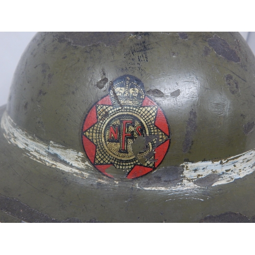 549 - WWII National Fire Service Steel Helmet with Web Chin Strap. Please Note: Customers must satisfy the... 