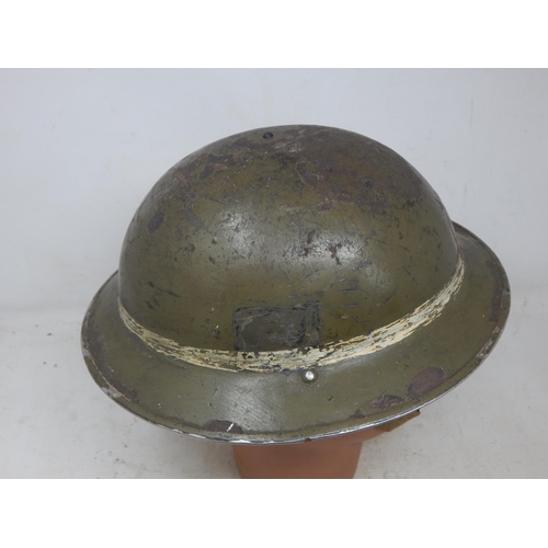 549 - WWII National Fire Service Steel Helmet with Web Chin Strap. Please Note: Customers must satisfy the... 