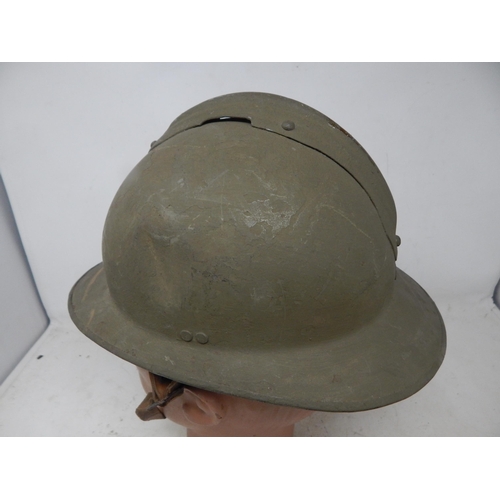 550 - WWI French MI5 Adrian Helmet. Please Note: Customers must satisfy themselves prior to bidding in reg... 