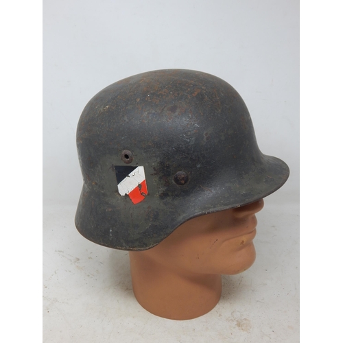 551 - WWII German M35 Helmet. Numbered Inside 3083. Please Note: Customers must satisfy themselves prior t... 