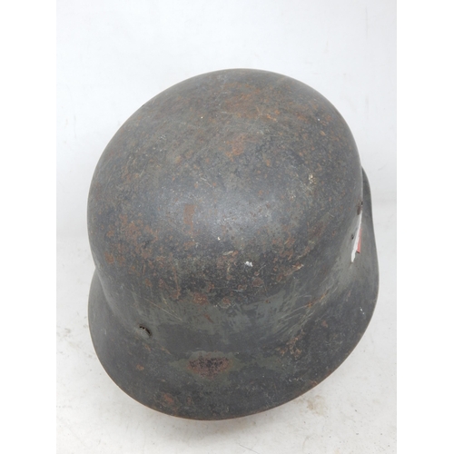 551 - WWII German M35 Helmet. Numbered Inside 3083. Please Note: Customers must satisfy themselves prior t... 