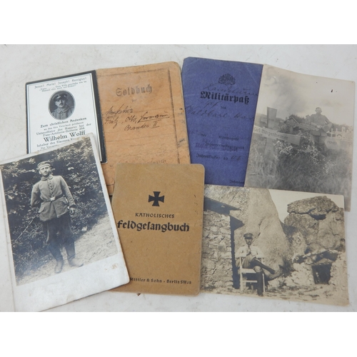 393 - WWI German Soldiers Pass Books & Photographs.