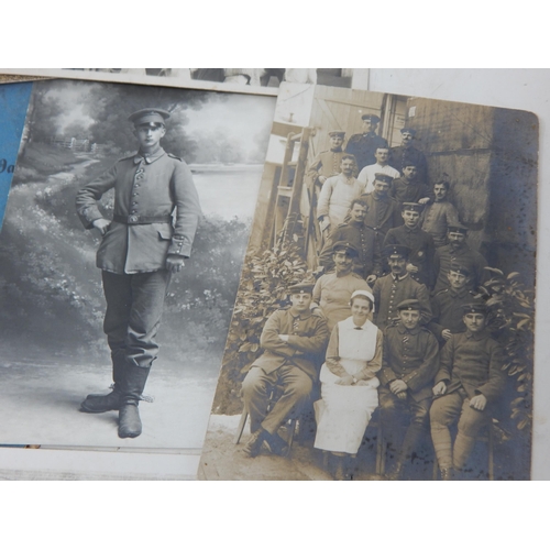 394 - WWI German Soldiers Pass Books & Photographs.