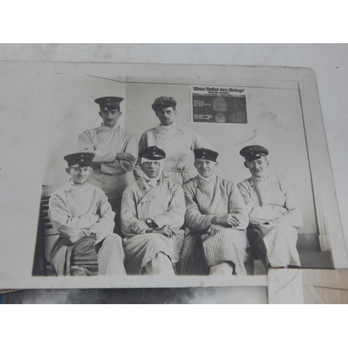 394 - WWI German Soldiers Pass Books & Photographs.