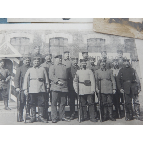 394 - WWI German Soldiers Pass Books & Photographs.