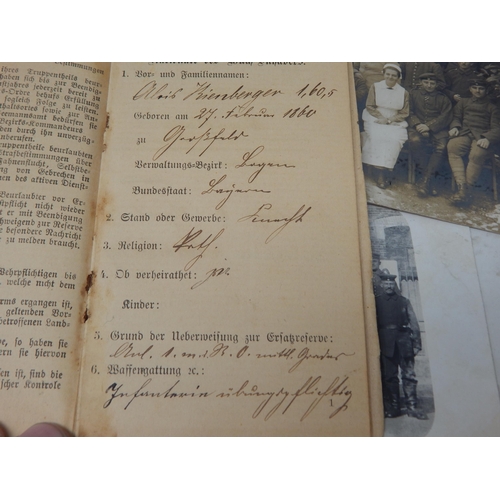 394 - WWI German Soldiers Pass Books & Photographs.