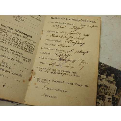 394 - WWI German Soldiers Pass Books & Photographs.